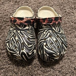 Animal print crocs. Brand new never worn. Size 9 women’s and size 7 men’s.